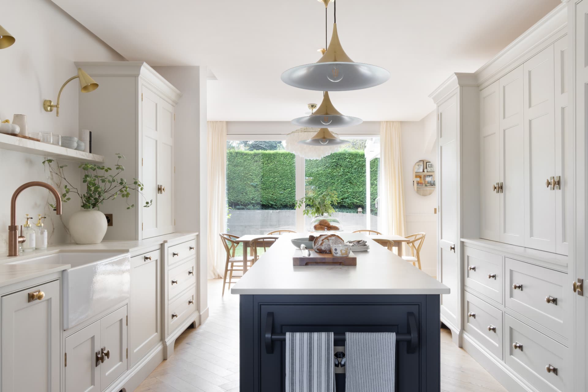 Lake Geneva House — full depth of the kitchen looking through to the dining table and garden window